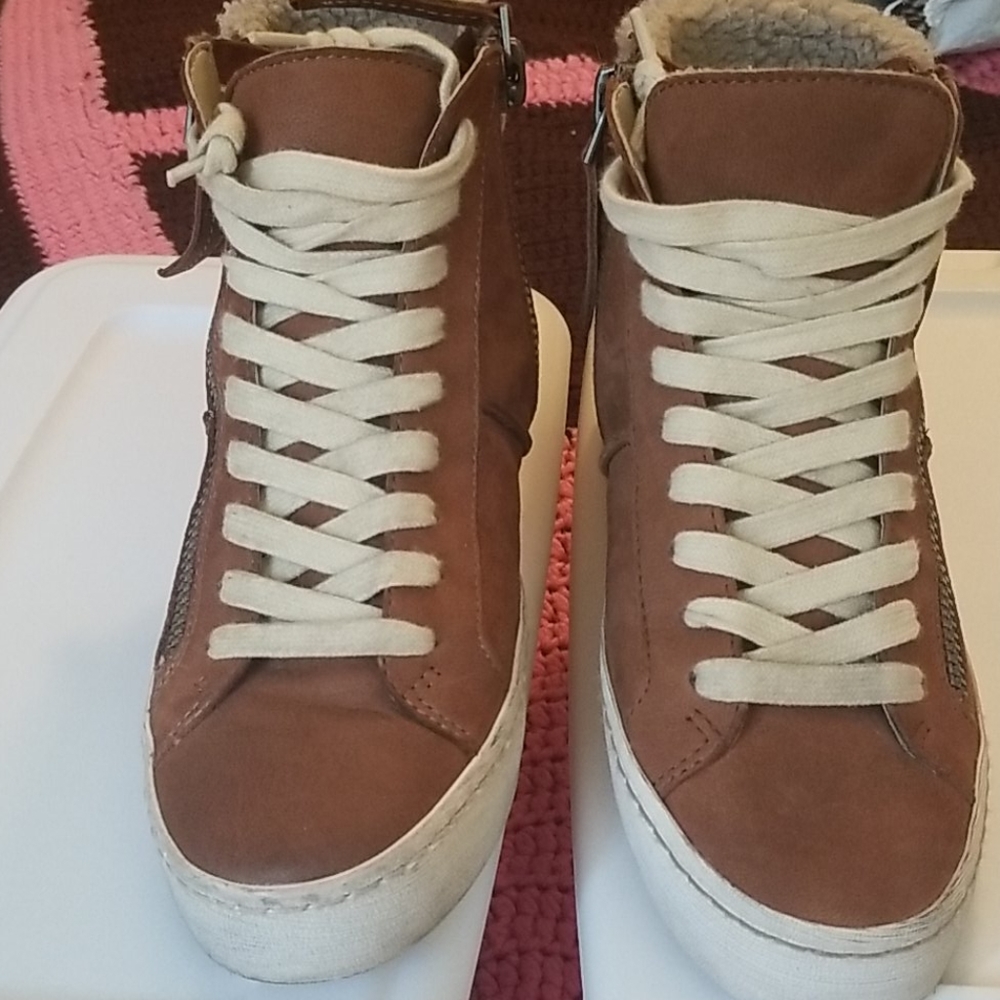 Dolce Vita brown boots.